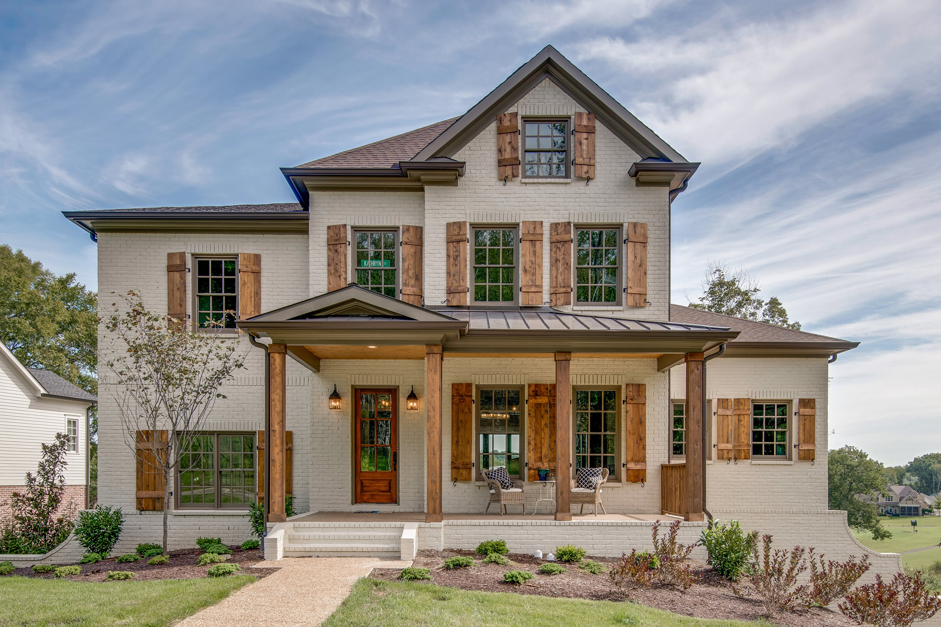 Three-story Painted Brick Custom Home